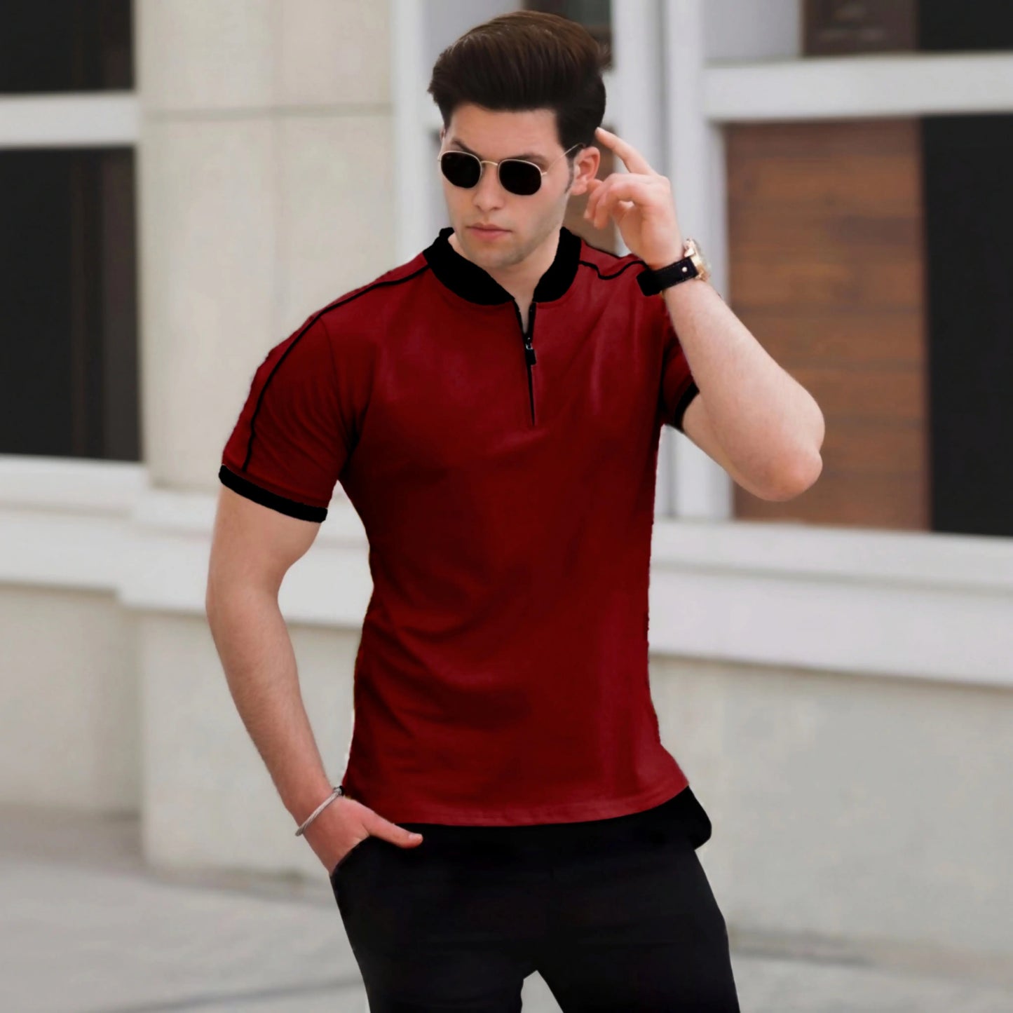 Men's maroon zipper polo shirt with black collar and sleeve detailing - modern casual wear