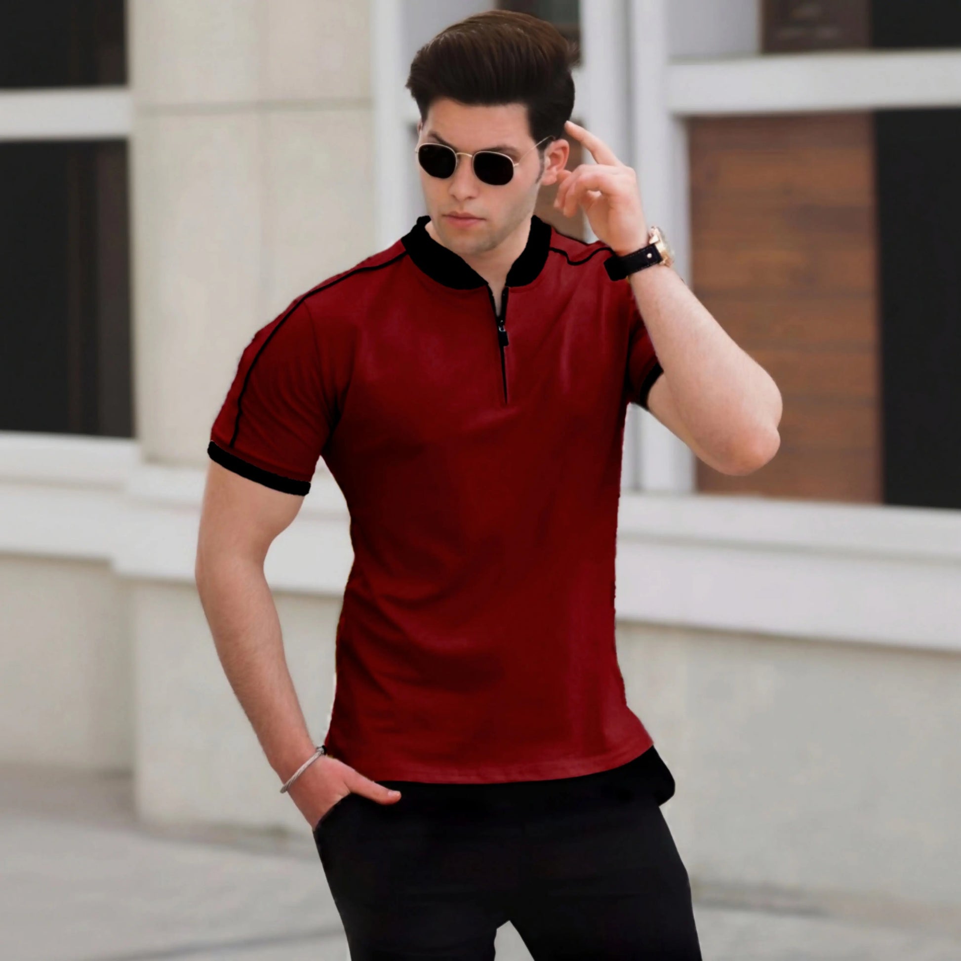 Men's maroon zipper polo shirt with black collar and sleeve detailing - modern casual wear